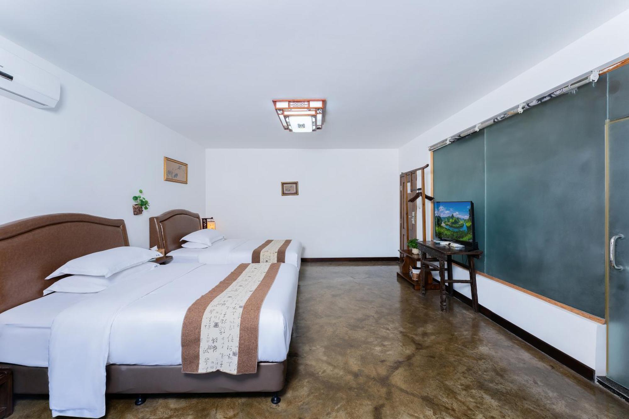 Leisure Courtyard Hotel Yangshuo-Free Shuttle Bus To Yangshuo Station Stay 2 Nights One Way Bagian luar foto