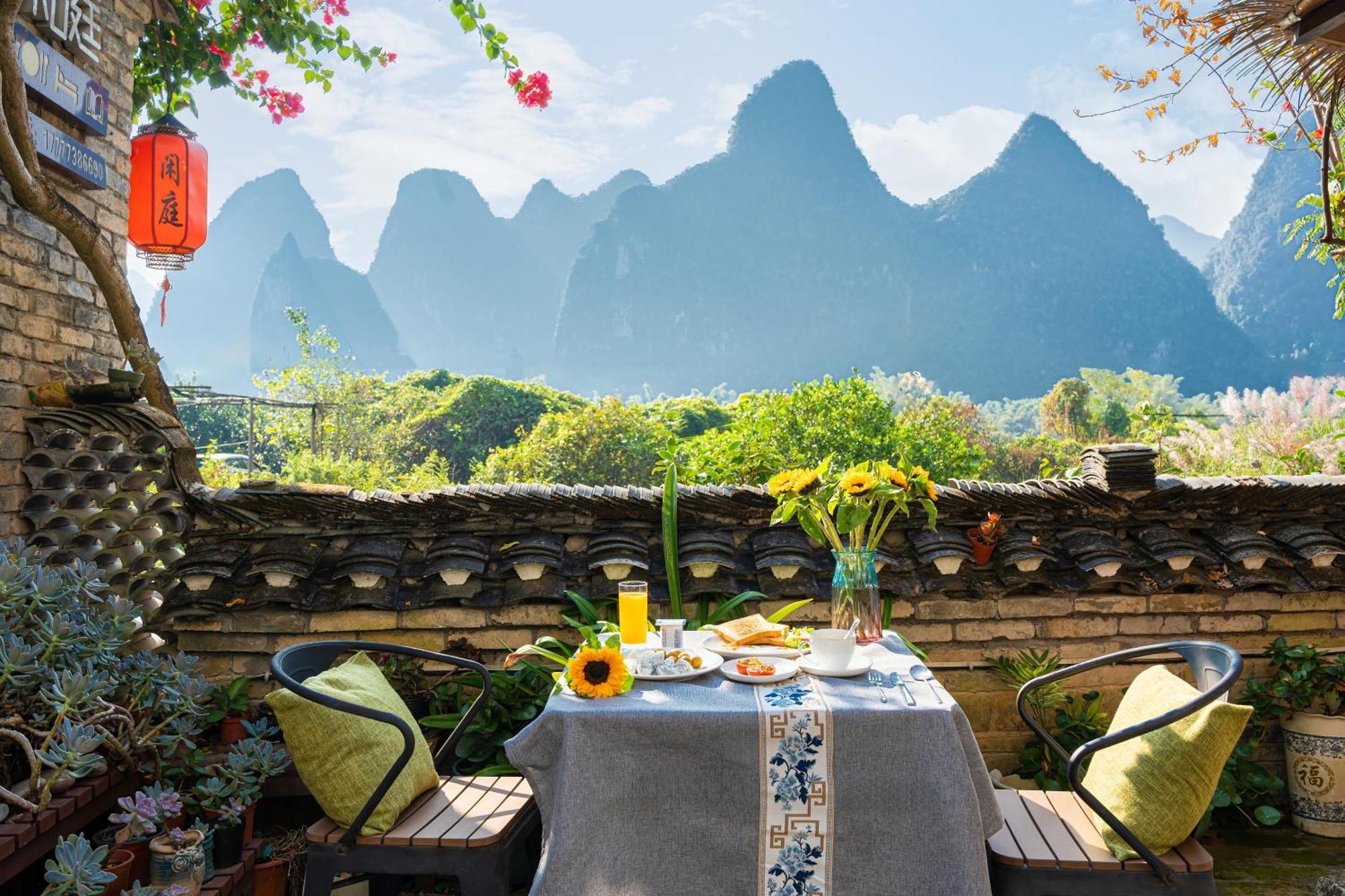 Leisure Courtyard Hotel Yangshuo-Free Shuttle Bus To Yangshuo Station Stay 2 Nights One Way Bagian luar foto